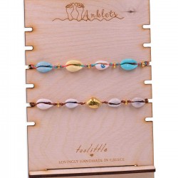 Wooden display with Toolittle logo for anklets Wooden display with Toolittle logo for anklets
