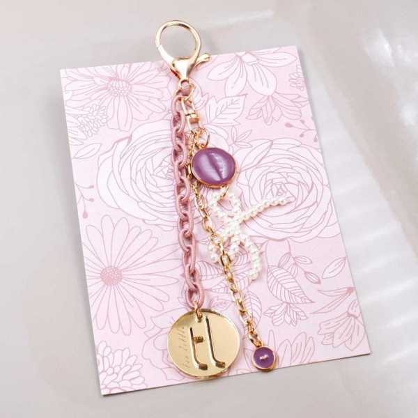 Handmade bag charm with pearl bow Handmade bag charm with pearl bow