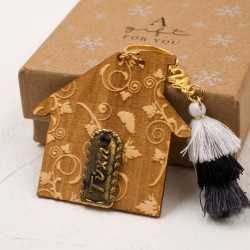 Handmade lucky charm 2025 with metallic part in a gift box