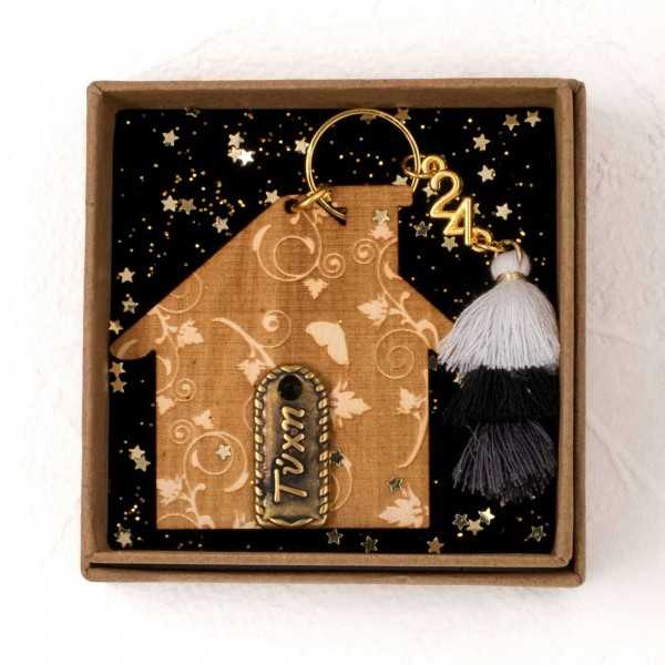 Handmade lucky charm 2025 with metallic part in a gift box