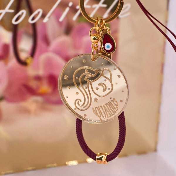 Aquarius Sign Keychain made of plexiglass Handmade Aquarius Sign key-chain made of plexiglass with gold-plated parts and enamel