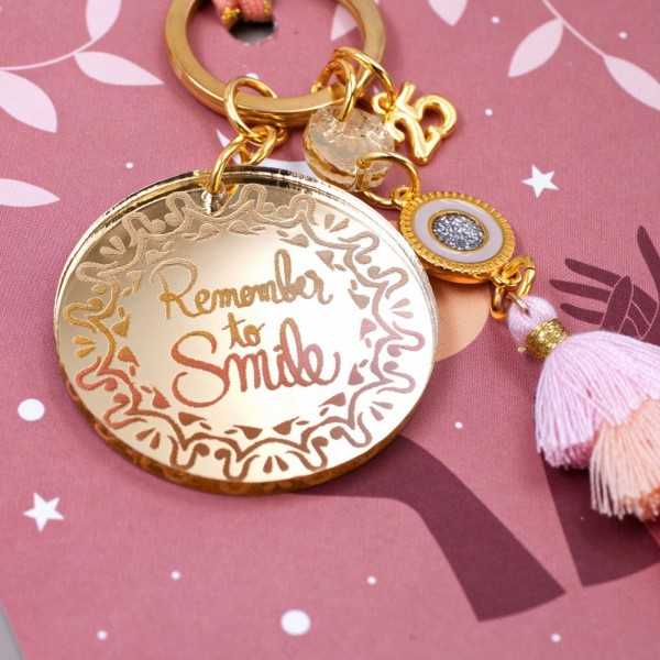 Μπρελόκ Γούρι με μήνυμα Remember to Smile Χειροποίητο μπρελόκ γούρι από πλέξιγκλας και επίχρυσα στοιχεία