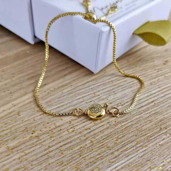 Βραχιόλι αλυσίδα με λουλούδι γέννησης Βραχιόλι αλυσίδα με λουλούδι γέννησης σε επίχρυση επιμετάλλωση