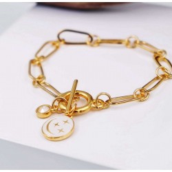 Βραχιόλι αλυσίδα με κρύσταλλο Swarovski Επίχρυσο βραχιόλι αλυσίδα από ανοξείδωτο ατσάλι με σμάλτο και κρύσταλλο Swarovski