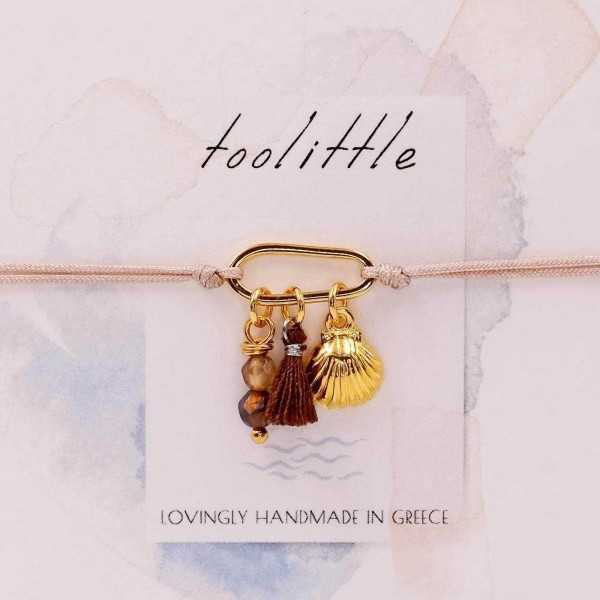 Handmade macrame bracelet with gold-plated parts and decorative card Handmade macrame bracelet with gold-plated parts and decorative card