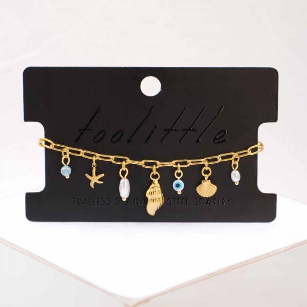Chain bracelet with sea elements and evil eye Handmade bracelet made of chain with gold-plated metal parts