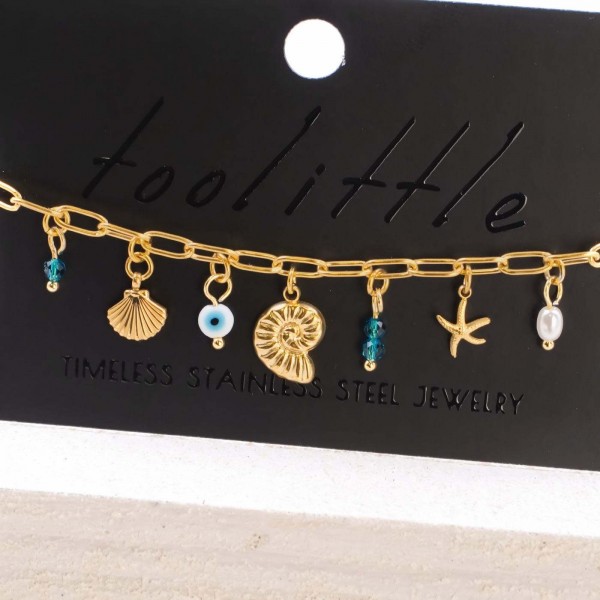 Chain bracelet with sea elements and evil eye Handmade bracelet made of chain with gold-plated metal parts