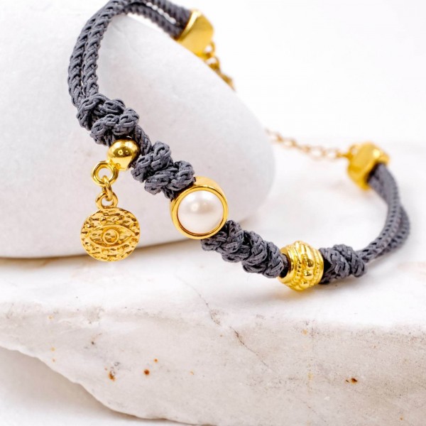 Handmade bracelet made of cord and Swarovski pearl