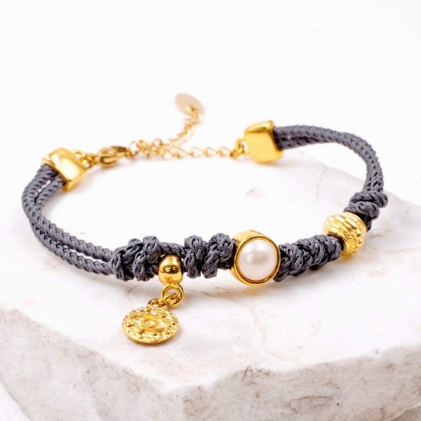 Handmade bracelet made of cord and Swarovski pearl