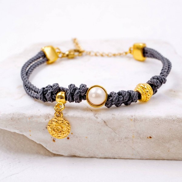 Handmade bracelet made of cord and Swarovski pearl