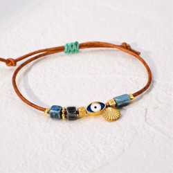 Macrame bracelet with gold-plated enamelled evil eye Handmade macrame bracelet with gold-plated enamelled evil eye