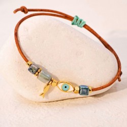 Macrame bracelet with gold-plated enamelled metal evil eye Handmade macrame bracelet with gold-plated enamelled metal evil eye
