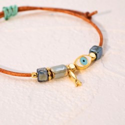 Macrame bracelet with gold-plated enamelled metal evil eye Handmade macrame bracelet with gold-plated enamelled metal evil eye