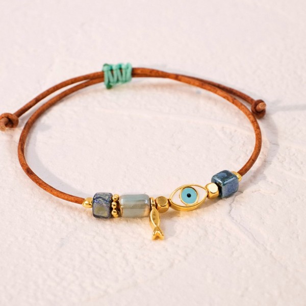 Macrame bracelet with gold-plated enamelled metal evil eye Handmade macrame bracelet with gold-plated enamelled metal evil eye