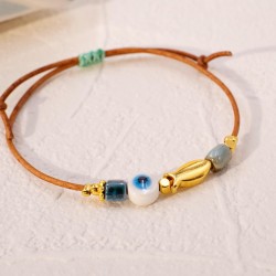 Macrame bracelet with ceramic evil eye Handmade macrame bracelet with ceramic evil eye