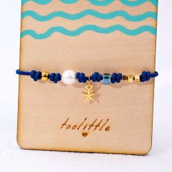 Macrame bracelet with metallic starfish and pearl Handmade macrame bracelet with metallic starfish and pearl