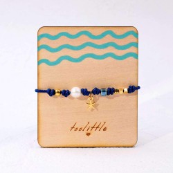 Macrame bracelet with metallic starfish and pearl Handmade macrame bracelet with metallic starfish and pearl