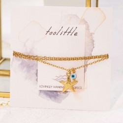 Gold-plated chain necklace with metallic starfish Chain necklace and gold-plated parts made of stainless steel