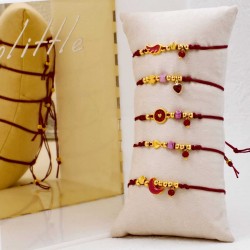 Set of 5 handmade bracelets with gold-plated parts Set of 5 handmade bracelets with gold-plated parts, ceramic beads and enamel