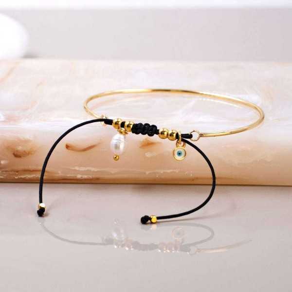 Rod bracelet with gold-plated enamelled evil eye and fresh water pearl Handmade rod bracelet with gold-plated enamelled evil eye and fresh water pearl