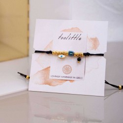 Macrame bracelet with gold-plated enamelled evil eye Handmade macrame bracelet with gold-plated enamelled evil eye