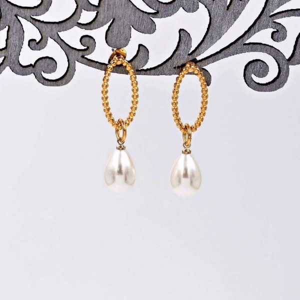 Handmade earrings with gold-plated parts and pearls Handmade earrings with gold-plated parts and pearls