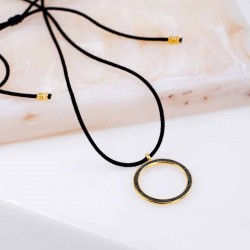 Long necklace with metallic pendant Long necklace with metallic pendant with organic shape