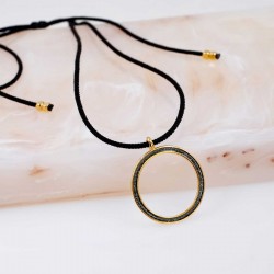 Long necklace with metallic pendant Long necklace with metallic pendant with organic shape