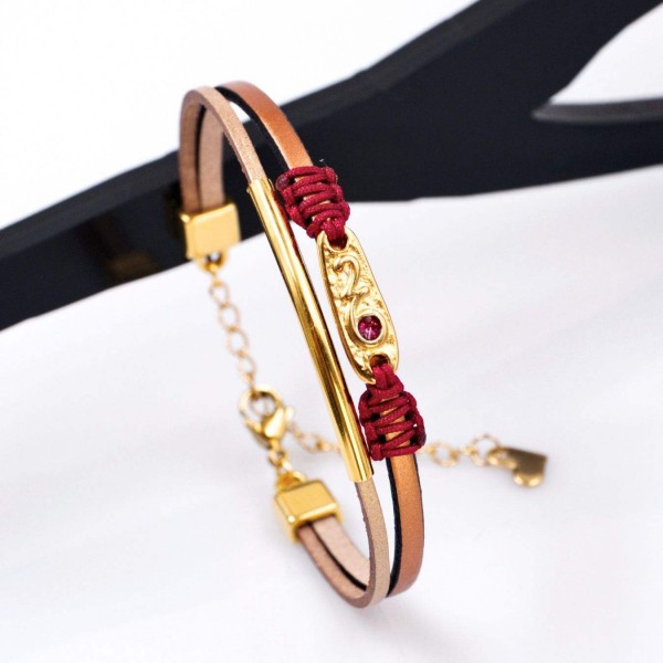 Leather 2026 lucky bracelet with metal parts in gold-plating and enamel