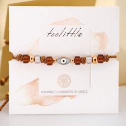 Evil Eye Bracelet – Rose Gold 24K and Enamel Handmade macrame bracelet in rose gold-plating and enamelled evil eye