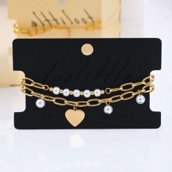 Stainless Steel Jewelry: Βραχιόλι Γούρι Καρδιά & Πέρλες Διπλό επίχρυσο βραχιόλι από ανοξείδωτο ατσάλι με καρδιά και πέρλες