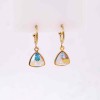 Gold-Plated Earrings: Stainless Steel & Swarovski Crystals  Stainless steel Hoop Earrings with 24K gold plating and Swarovski Crystals