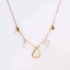 Chain necklace with metal charms of stainless steel and 24K Gold plating