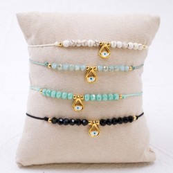 Set of 4 Handmade Macramé Bracelets with Gold-Plated Evil Eye & Crystals Set of 4 Handmade Macramé Bracelets with Gold-Plated Evil Eye and Crystals