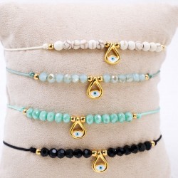 Set of 4 Handmade Macramé Bracelets with Gold-Plated Evil Eye & Crystals Set of 4 Handmade Macramé Bracelets with Gold-Plated Evil Eye and Crystals
