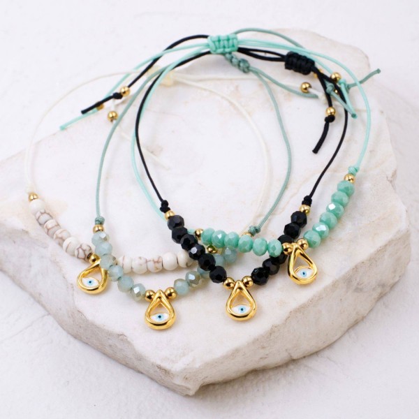 Set of 4 Handmade Macramé Bracelets with Gold-Plated Evil Eye & Crystals Set of 4 Handmade Macramé Bracelets with Gold-Plated Evil Eye and Crystals