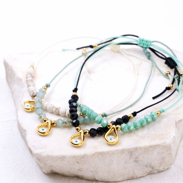 Set of 4 Handmade Macramé Bracelets with Gold-Plated Evil Eye & Crystals Set of 4 Handmade Macramé Bracelets with Gold-Plated Evil Eye and Crystals