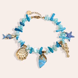 Stainless Steel Jewelry: Καλοκαιρινό Βραχιόλι με Κοχύλια & Κοράλλια Επίχρυσο βραχιόλι από ανοξείδωτο ατσάλι με θαλασσινά στοιχεία