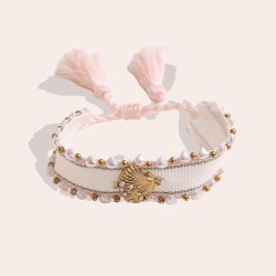 Υφασμάτινο Μακραμέ Βραχιόλι Κοχύλι Υφασμάτινο μακραμέ βραχιόλι με κοχύλι και πέρλες
