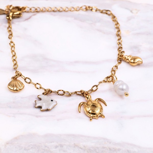 Stainless Steel Jewelry: Καλοκαιρινό Βραχιόλι με Χελώνα & Καλλιεργημένο Μαργαριτάρι Επίχρυσο βραχιόλι από ανοξείδωτο ατσάλι με θαλασσινά στοιχεία και καλλιεργημένο μαργαριτάρι